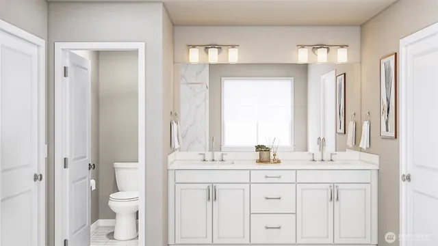 a bathroom with a double vanity sink a toilet and a mirror