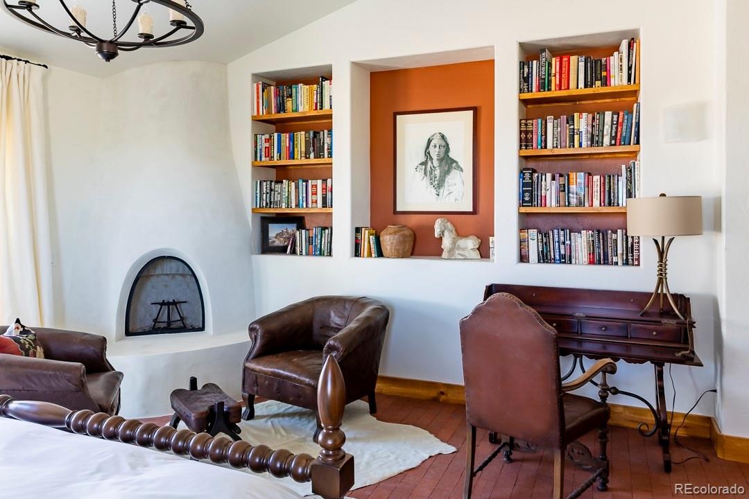 26794 Maul Road Elbert, CO 80106 - Photo 19 of 44 a workspace with a bookshelf