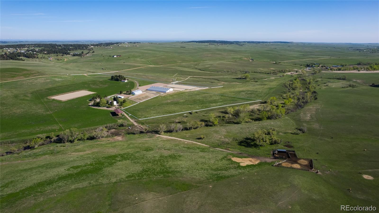 26794 Maul Road Elbert, CO 80106 - Photo 22 of 44 a view of a field with an ocean