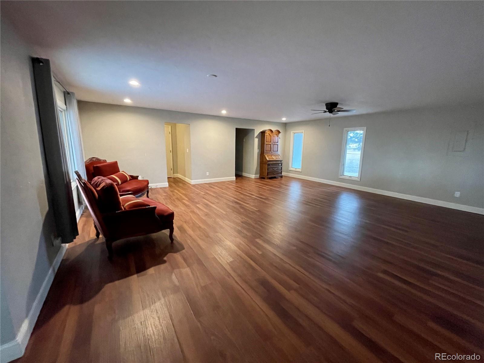 26794 Maul Road Elbert, CO 80106 - Photo 8 of 44 a living room with furniture and a hard wood floor