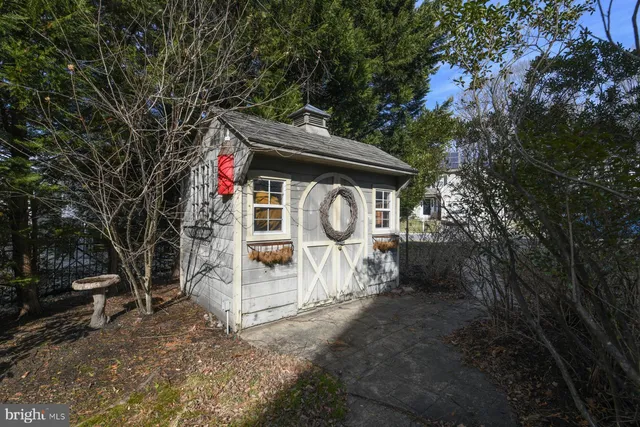 a front view of a house with barbeque