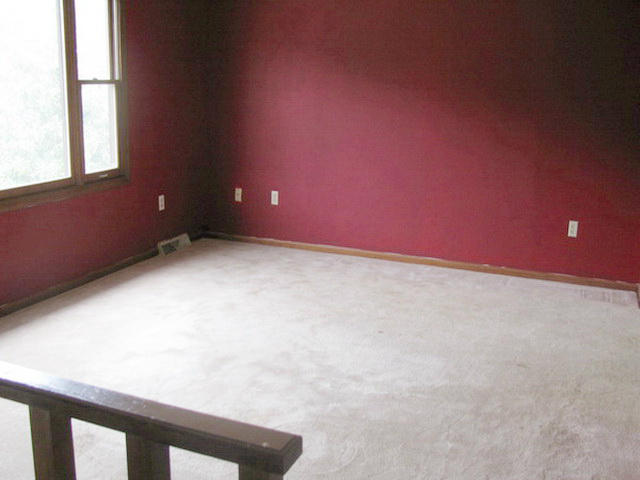 1227 Mountain Pass Road Blue Ridge, VA 24064 - Photo 2 of 8 a view of an empty room with a window