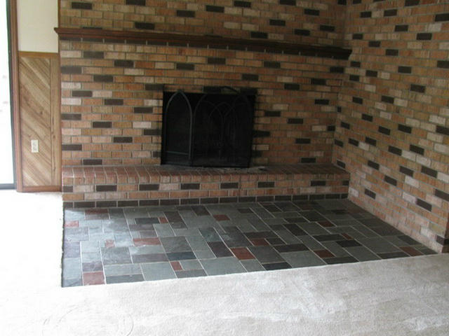 1227 Mountain Pass Road Blue Ridge, VA 24064 - Photo 6 of 8 a closeup of a fireplace
