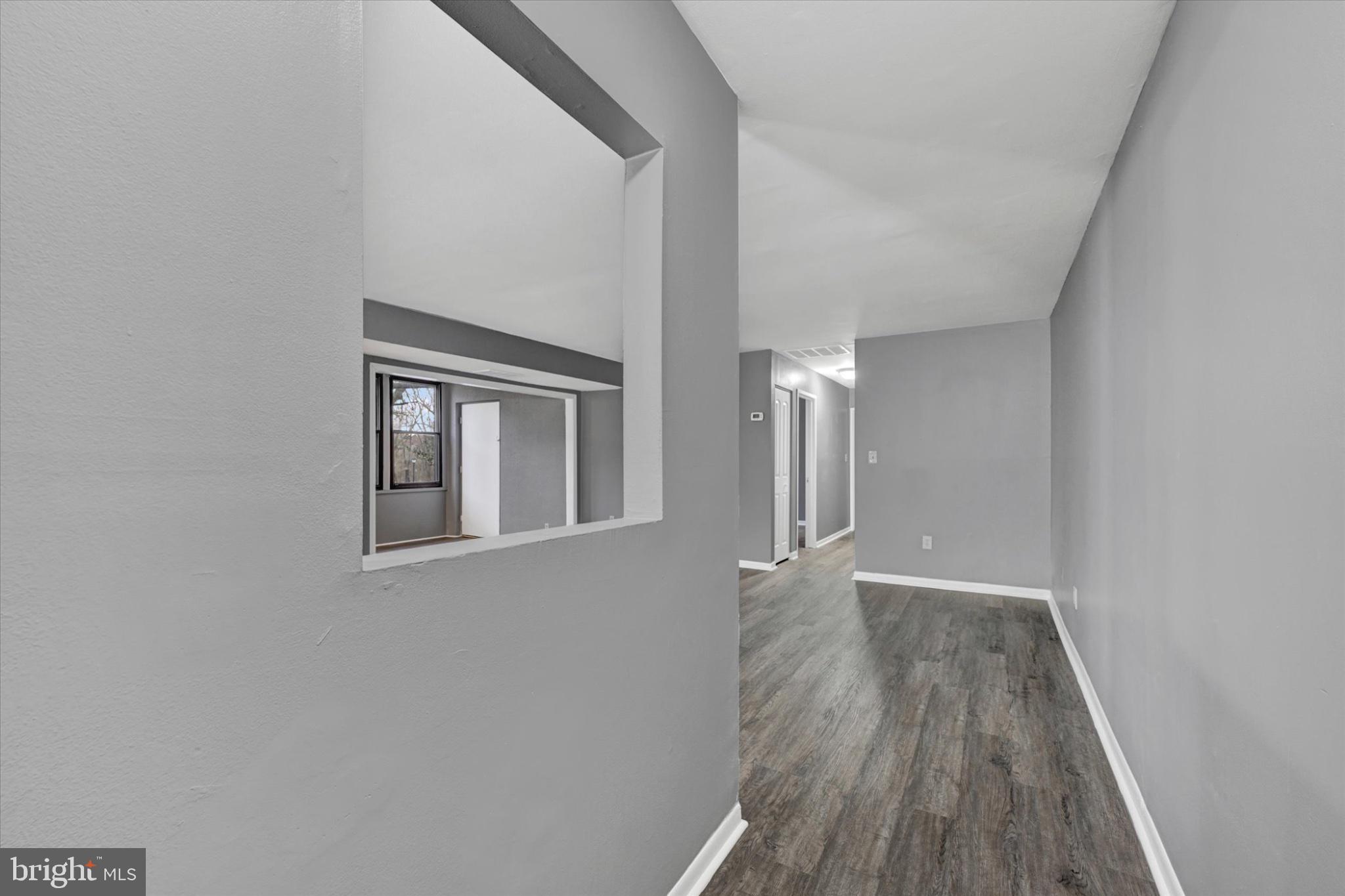 9635 White Acre Road, Unit B4 Columbia, MD 21045 - Photo 3 of 21 Modern hallway with sleek design.