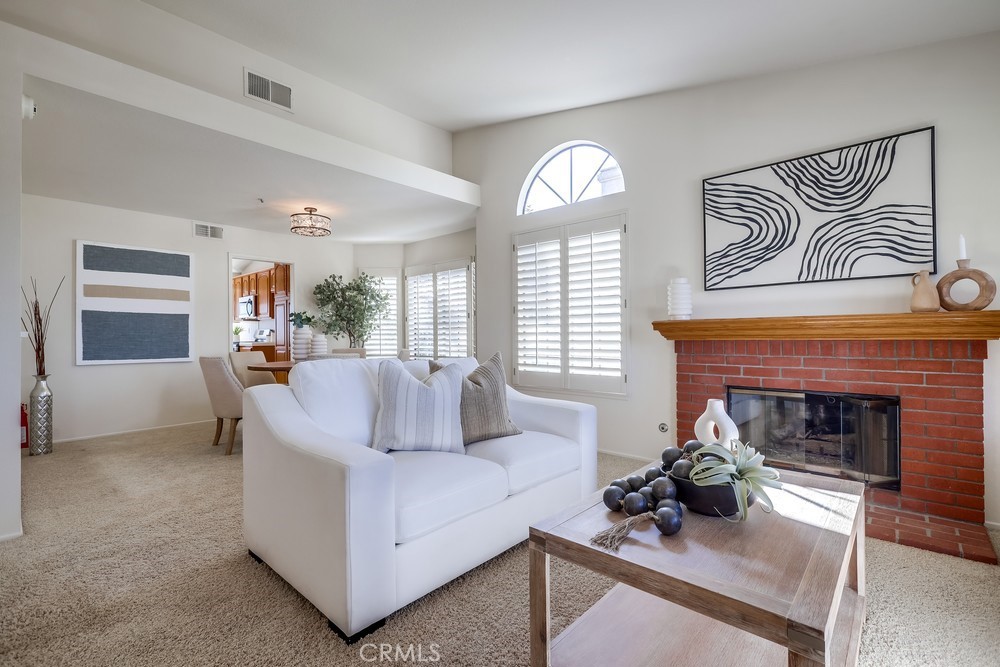 2945 Via Blanco San Clemente, CA 92673 - Photo 19 of 60 a living room with furniture and a fireplace