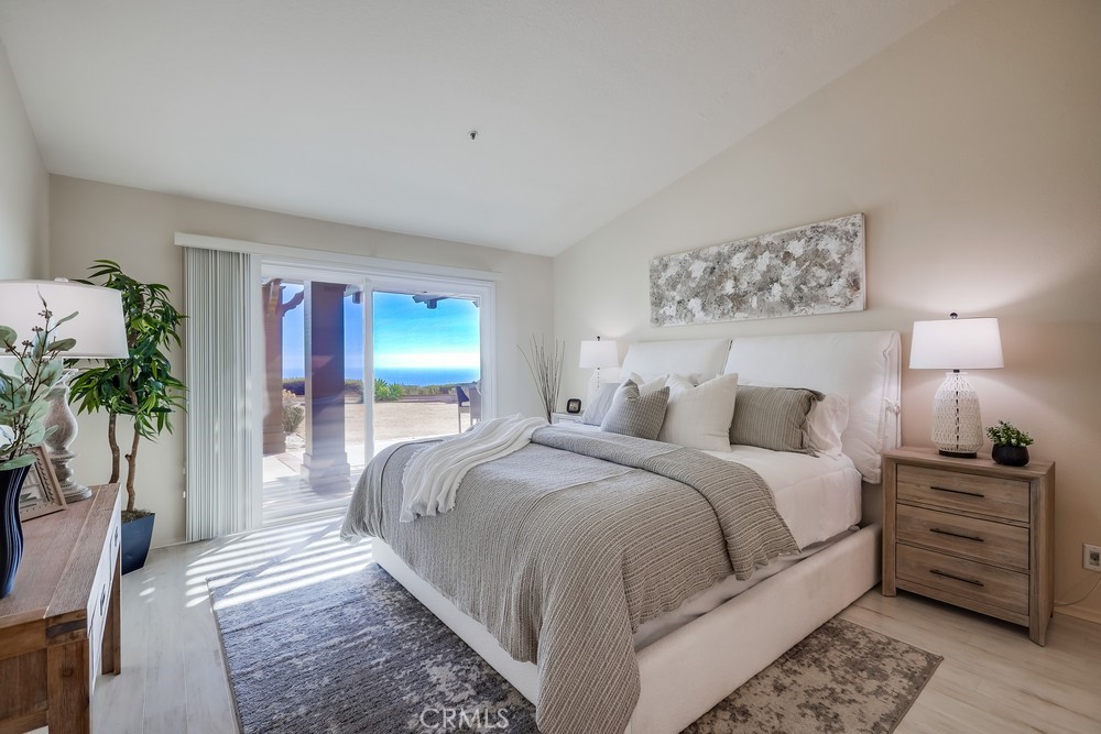 2945 Via Blanco San Clemente, CA 92673 - Photo 37 of 60 a bedroom with a bed and a lamp