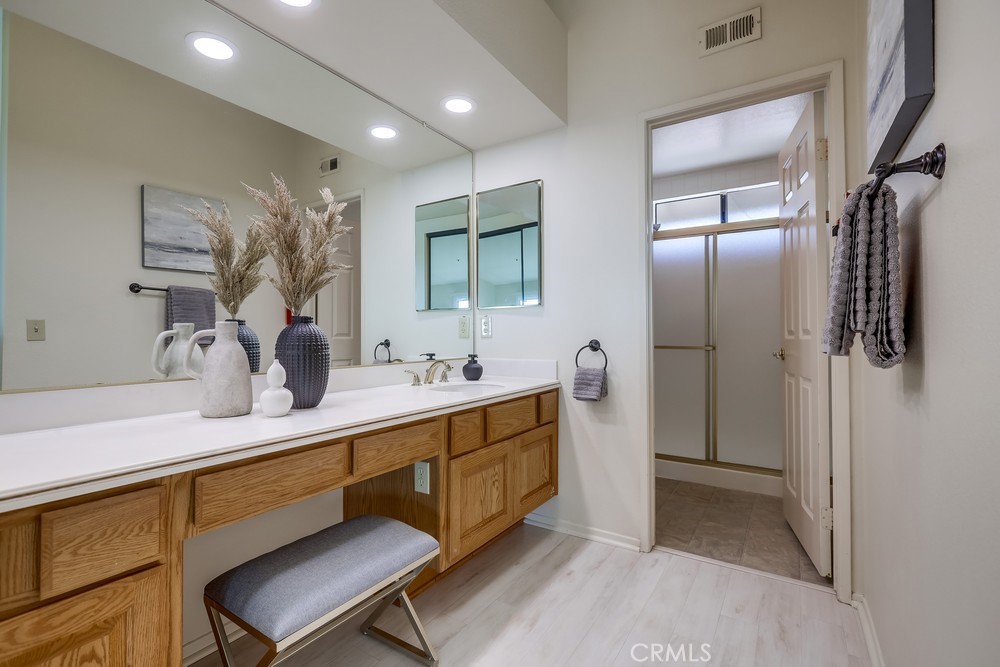 2945 Via Blanco San Clemente, CA 92673 - Photo 41 of 60 a bathroom with a double vanity sink mirror and shower
