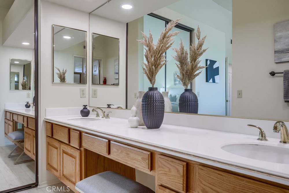 2945 Via Blanco San Clemente, CA 92673 - Photo 42 of 60 a bathroom with a double vanity sink and a mirror