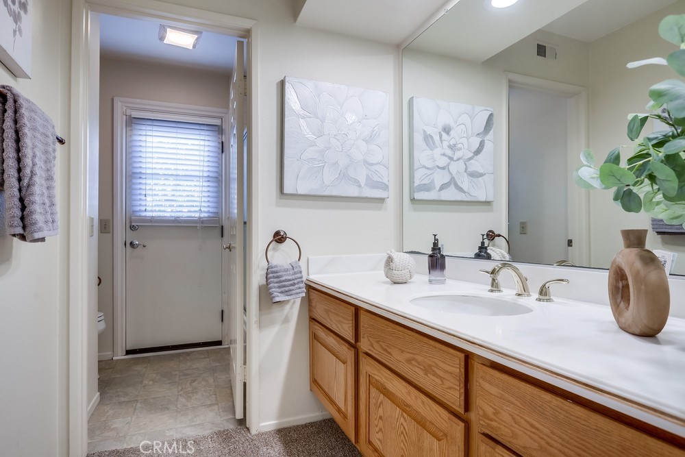 2945 Via Blanco San Clemente, CA 92673 - Photo 43 of 60 a bathroom with a sink a mirror and a shower
