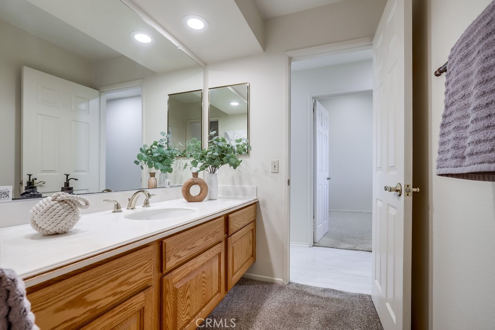 2945 Via Blanco San Clemente, CA 92673 - Photo 45 of 60 a bathroom with a sink and mirror