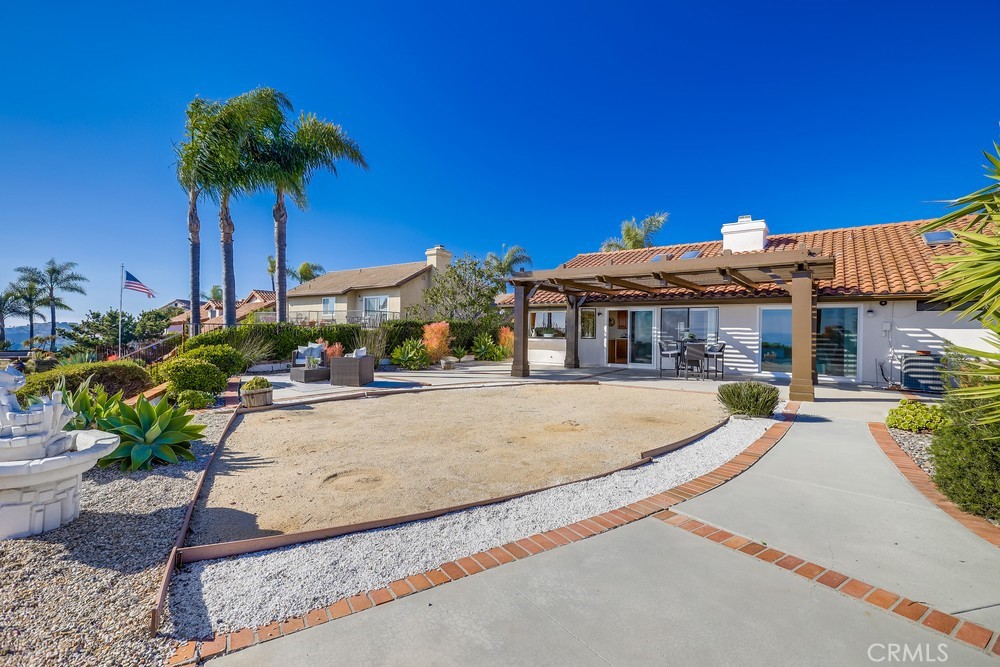 2945 Via Blanco San Clemente, CA 92673 - Photo 46 of 60 a view of a house with potted plants and palm trees