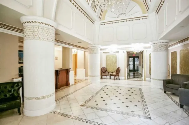 a bedroom with furniture and window