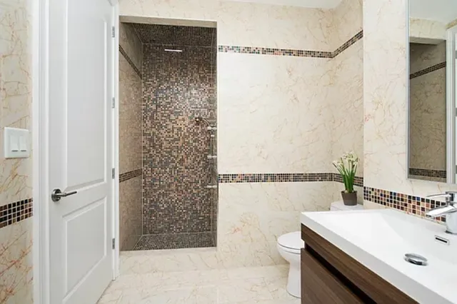 a bathroom with a bathtub and a sink