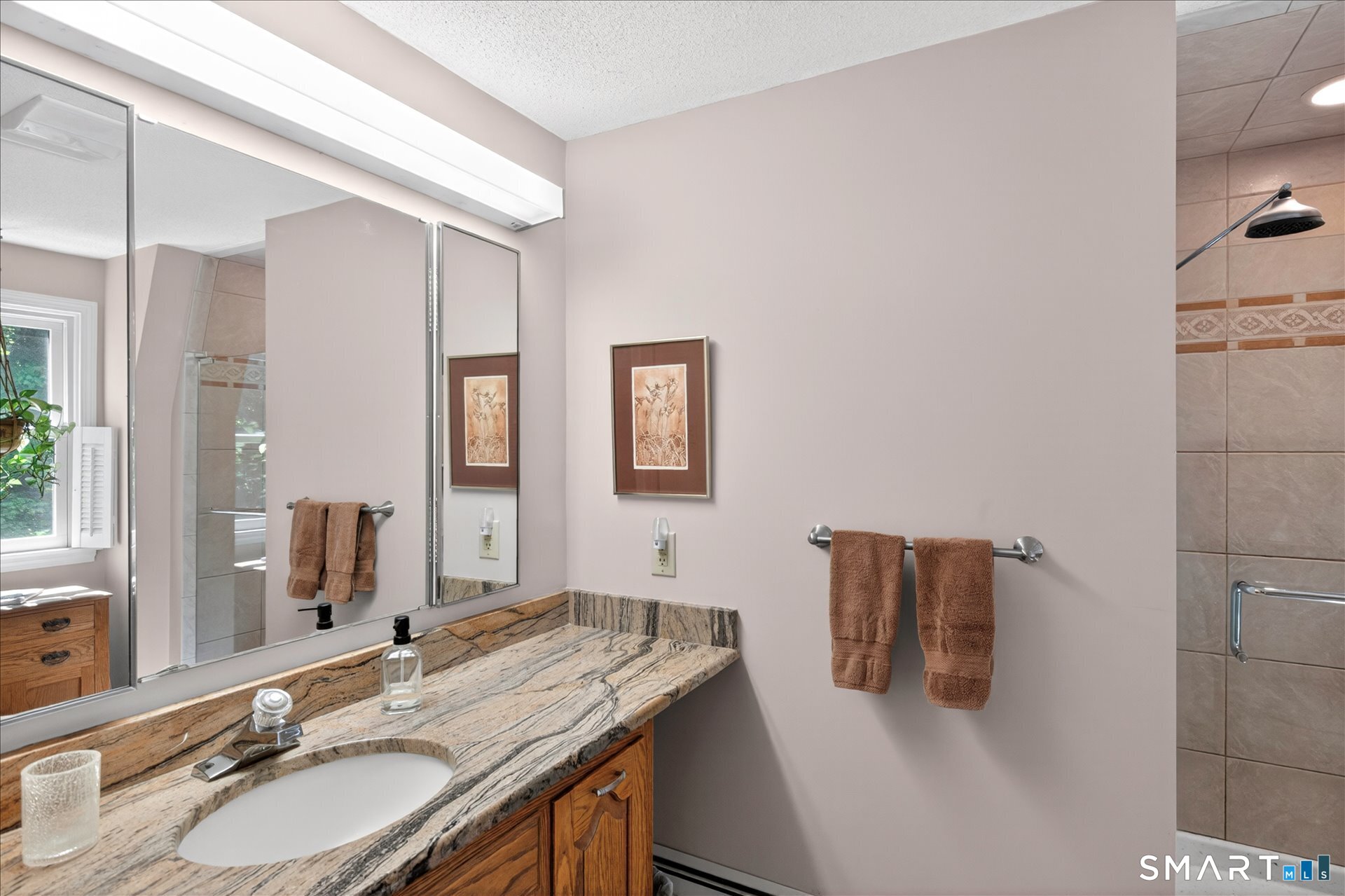 5 Shingle Mill Drive Canton, CT 06019 - Photo 26 of 38 a bathroom with a granite countertop sink and a mirror