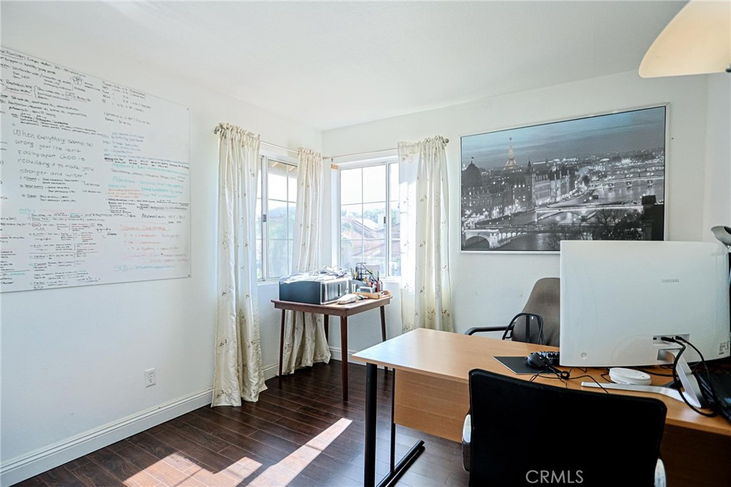13079 Winterpark Way Riverside, CA 92503 - Photo 20 of 33 a view of a workspace with furniture and a window