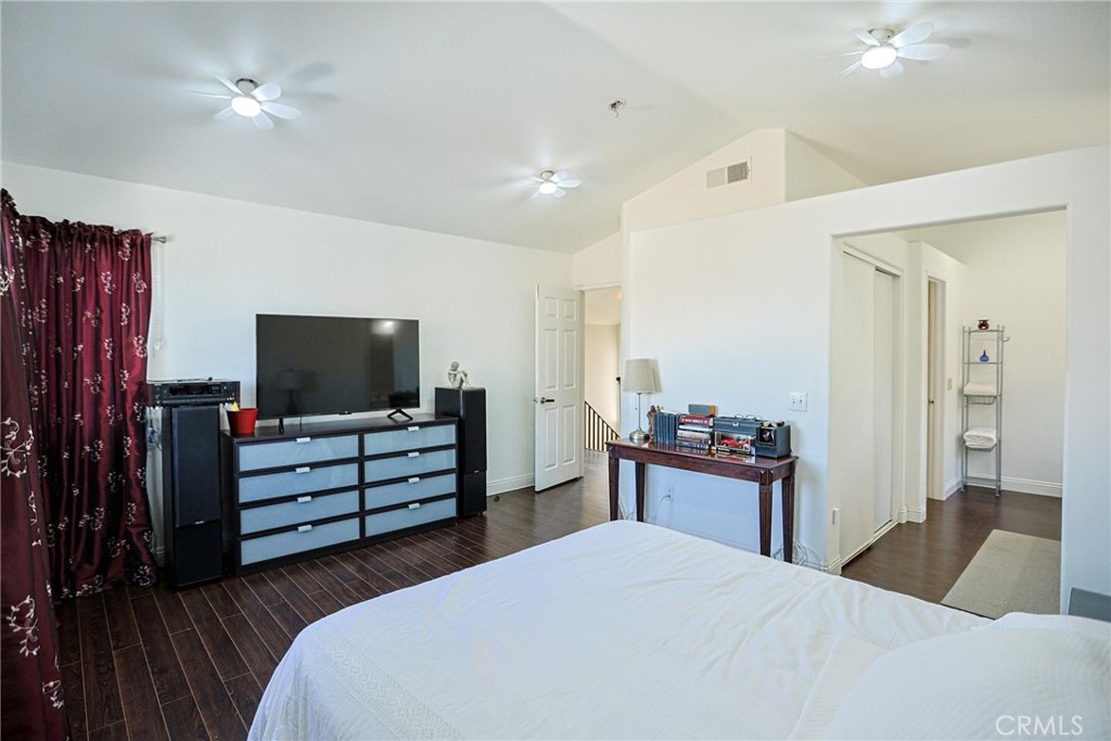 13079 Winterpark Way Riverside, CA 92503 - Photo 24 of 33 a bedroom with furniture and a flat screen tv
