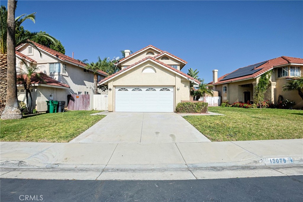 13079 Winterpark Way Riverside, CA 92503 - Photo 31 of 33 front view of house with a yard