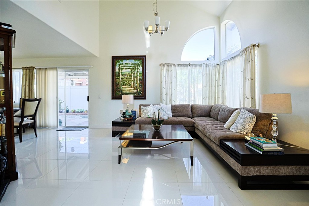 13079 Winterpark Way Riverside, CA 92503 - Photo 4 of 33 a living room with furniture and a large window