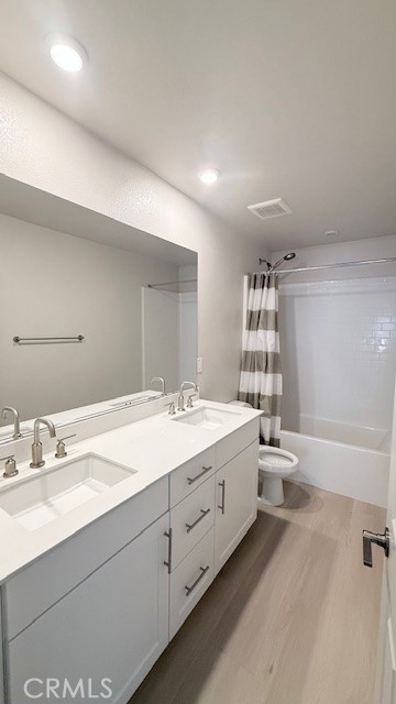 2112 Rio Grande Pomona, CA 91766 - Photo 9 of 10 a bathroom with a double vanity sink and a mirror