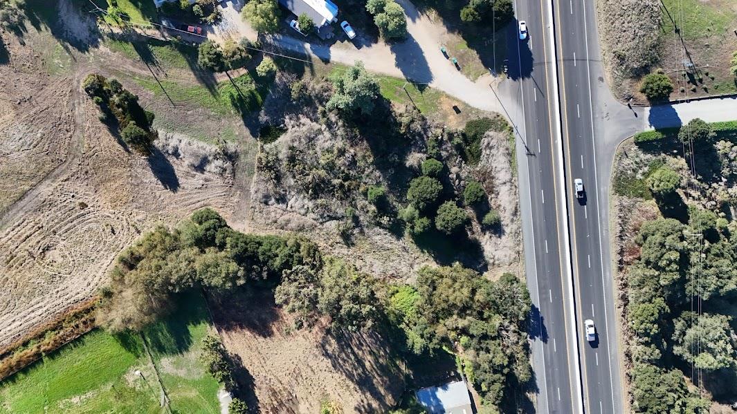10706 Country Meadows Road Salinas, CA 93907 - Photo 8 of 13 a view of a yard with plants and flowers