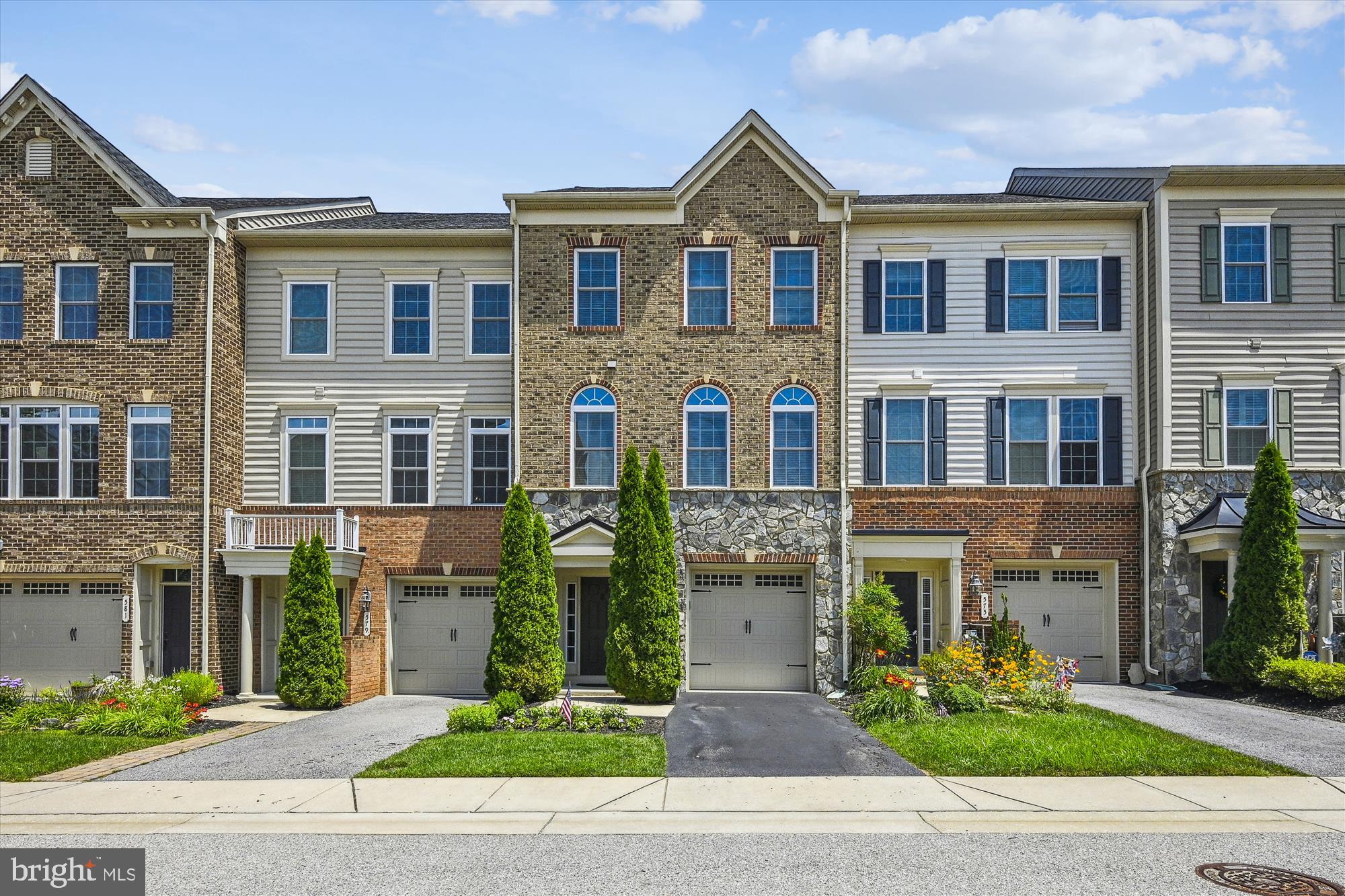 Upgraded Brick & Stone front on wonderful Townhome