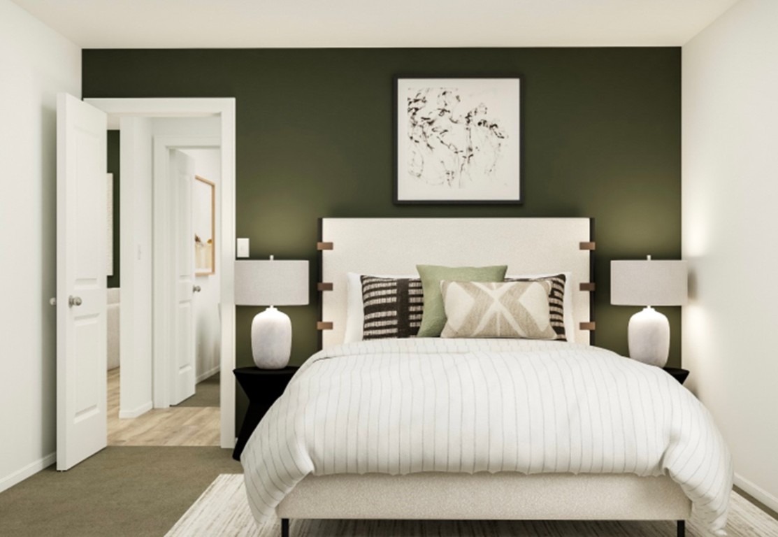 1808 Roaming Oak Bend Georgetown, TX 78628 - Photo 2 of 12 a bedroom with a bed and painting on the wall