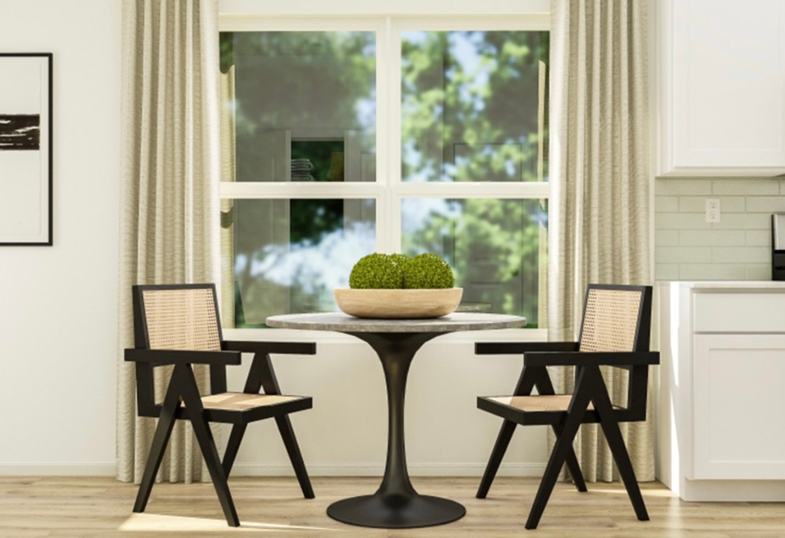 1808 Roaming Oak Bend Georgetown, TX 78628 - Photo 6 of 12 a dining room with furniture and a window