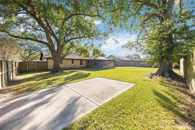 a view of a swimming pool with an outdoor space