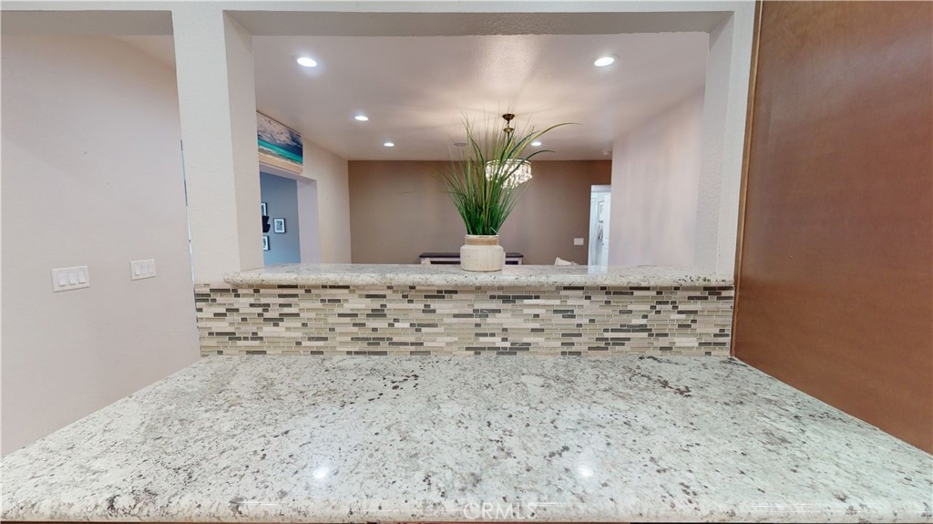 10039 Primrose Drive Riverside, CA 92503 - Photo 13 of 56 a view of a hallway with kitchen