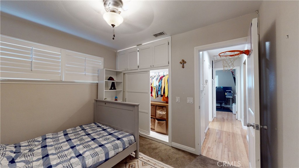 10039 Primrose Drive Riverside, CA 92503 - Photo 22 of 56 a kitchen with stainless steel appliances kitchen island granite countertop a refrigerator and a stove top oven