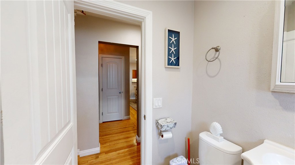 10039 Primrose Drive Riverside, CA 92503 - Photo 31 of 56 a bathroom with a shower and toilet