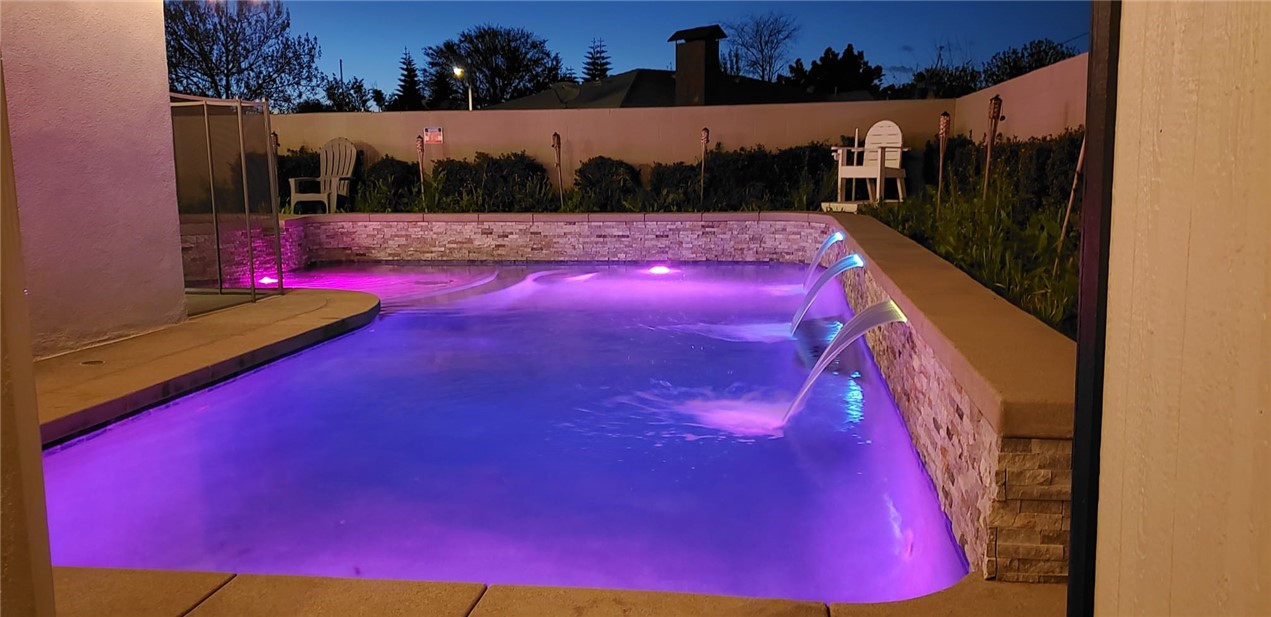 10039 Primrose Drive Riverside, CA 92503 - Photo 45 of 56 a view of swimming pool outdoor seating