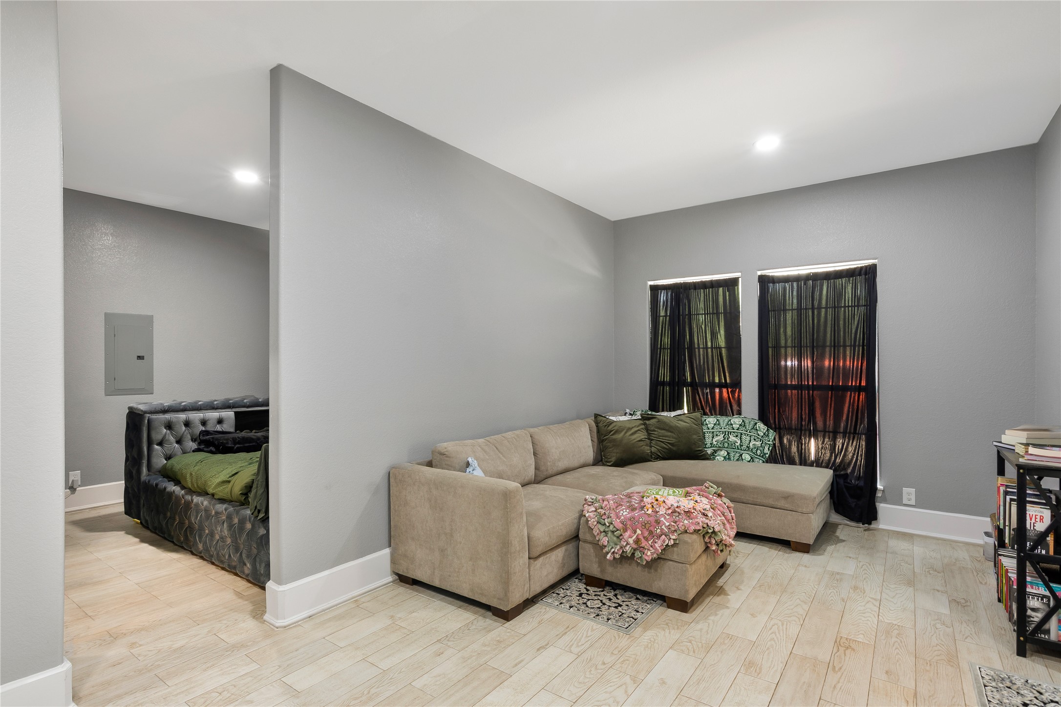 13914 Skinner Road Cypress, TX 77429 - Photo 36 of 50 Casita: Open bedroom and living space with recessed lighting, and a partial wall that adds separation while keeping the layout open.