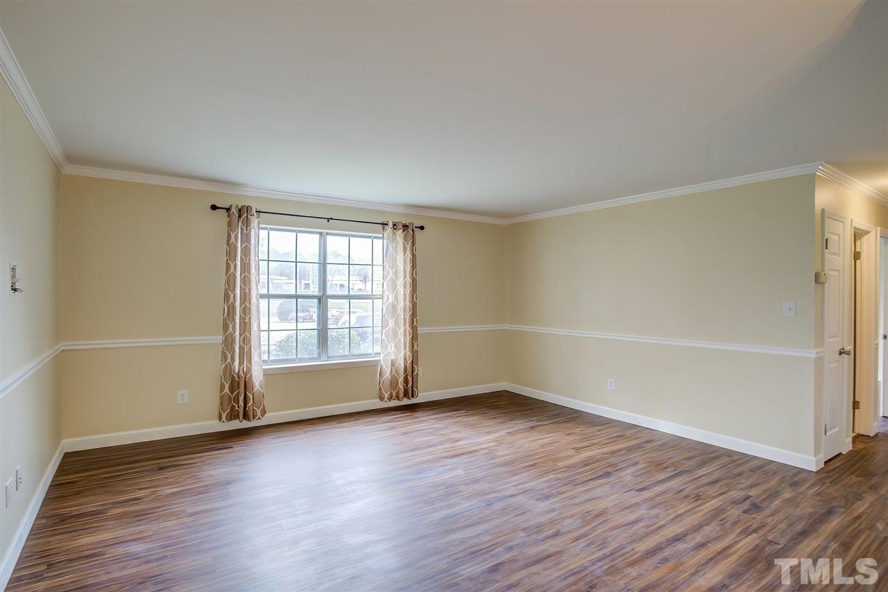 5608 Falls Of Neuse Road, Unit E Raleigh, NC 27609 - Photo 3 of 28 Smooth Ceilings, Crown Molding, Chair Rail