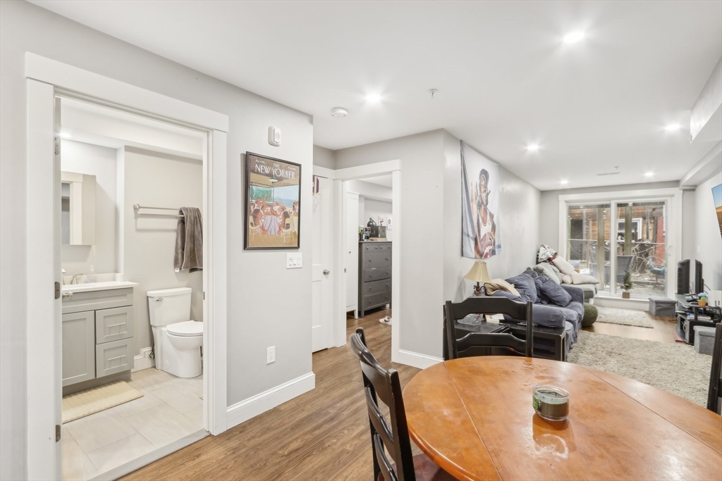 271 West Fifth Street Boston, MA 02127 - Photo 11 of 30 a living room with furniture a large window and wooden floor