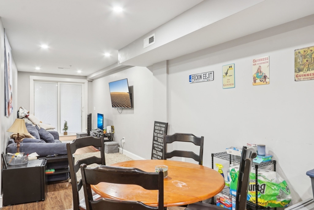 271 West Fifth Street Boston, MA 02127 - Photo 12 of 30 a living room with furniture