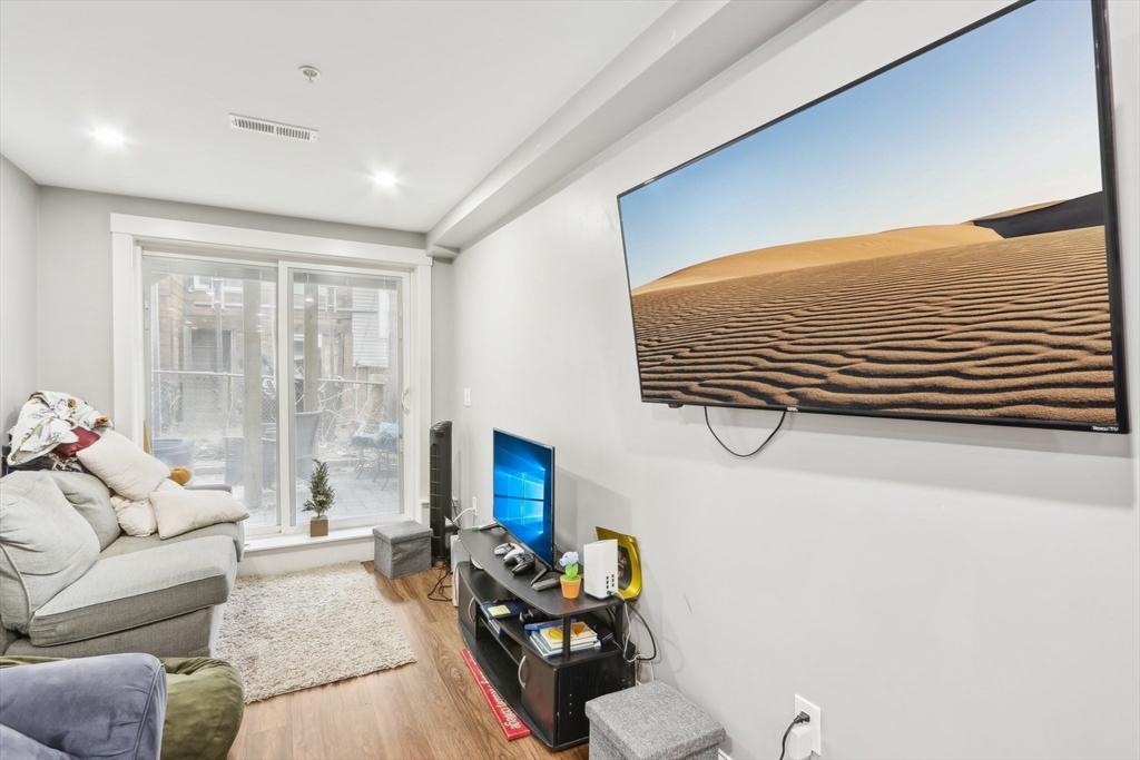 271 West Fifth Street Boston, MA 02127 - Photo 8 of 30 a living room with furniture