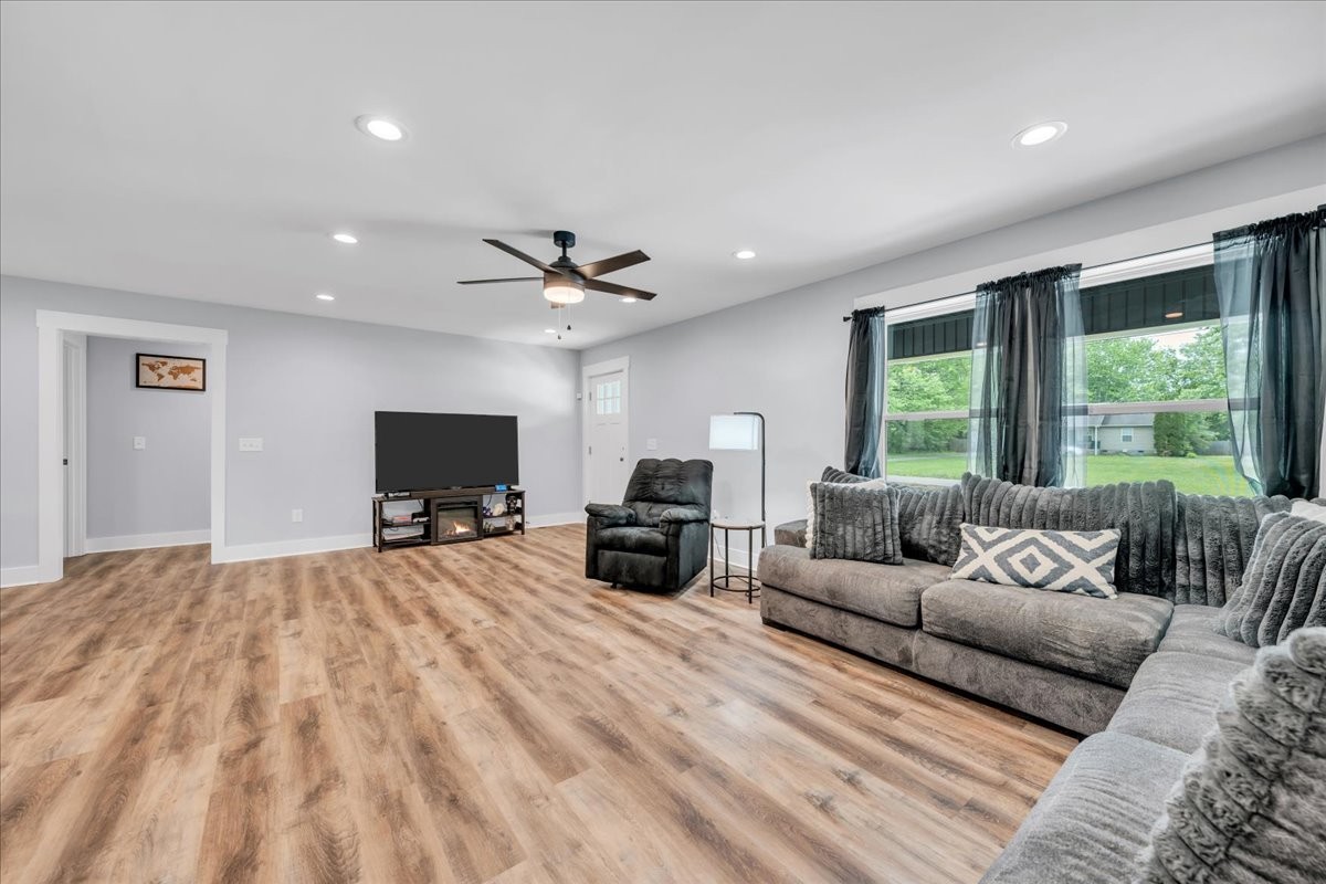 116 Carter Blake Road Tullahoma, TN 37388 - Photo 13 of 43 a living room with furniture and a flat screen tv
