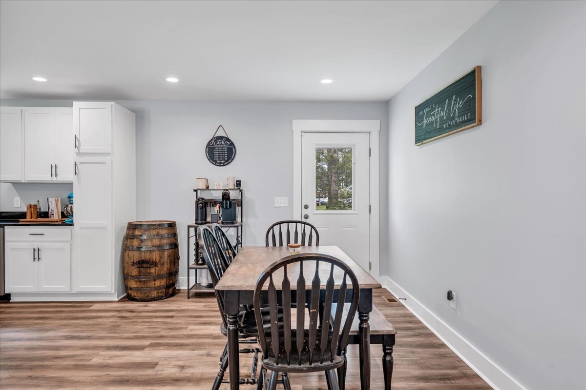 116 Carter Blake Road Tullahoma, TN 37388 - Photo 24 of 43 a view of a dining room with furniture and wooden floor