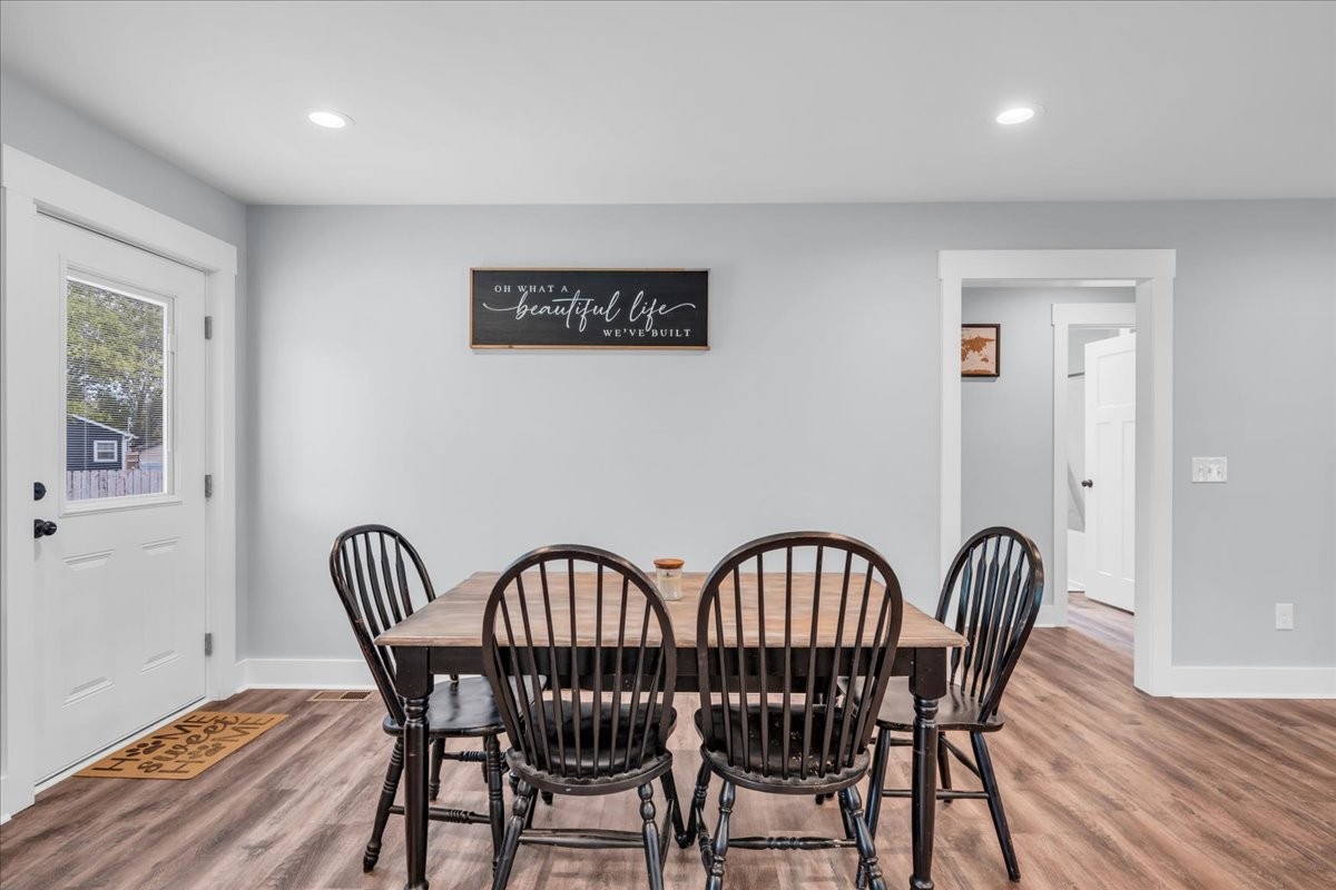 116 Carter Blake Road Tullahoma, TN 37388 - Photo 25 of 43 a view of a dining room with furniture and wooden floor