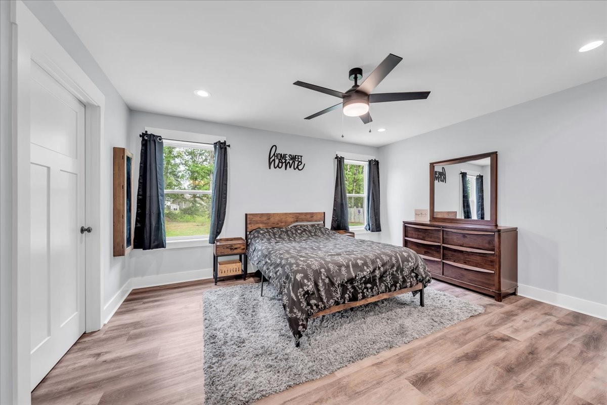 116 Carter Blake Road Tullahoma, TN 37388 - Photo 29 of 43 a bedroom with a bed wooden floor and window