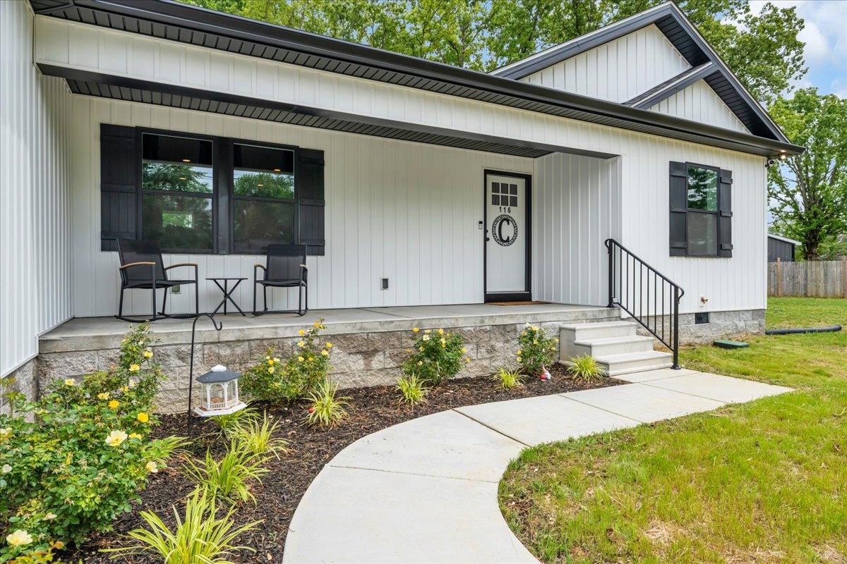 116 Carter Blake Road Tullahoma, TN 37388 - Photo 5 of 43 a front view of a house with garden