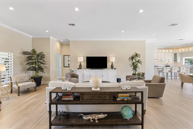 a kitchen with granite countertop a stove sink and cabinets