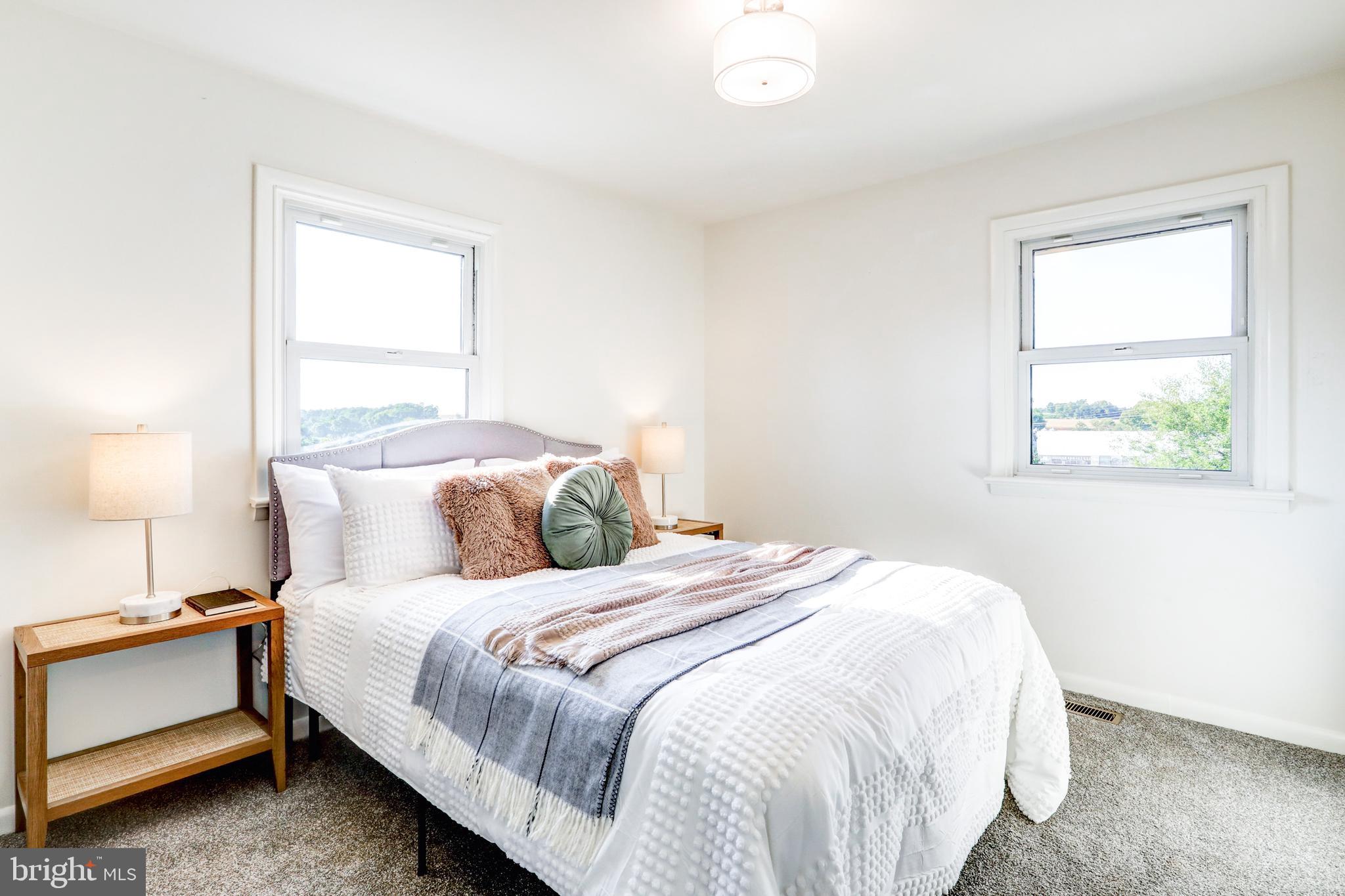 1198 Iron Bridge Road Columbia, PA 17512 - Photo 19 of 40 a bedroom with bed and a window
