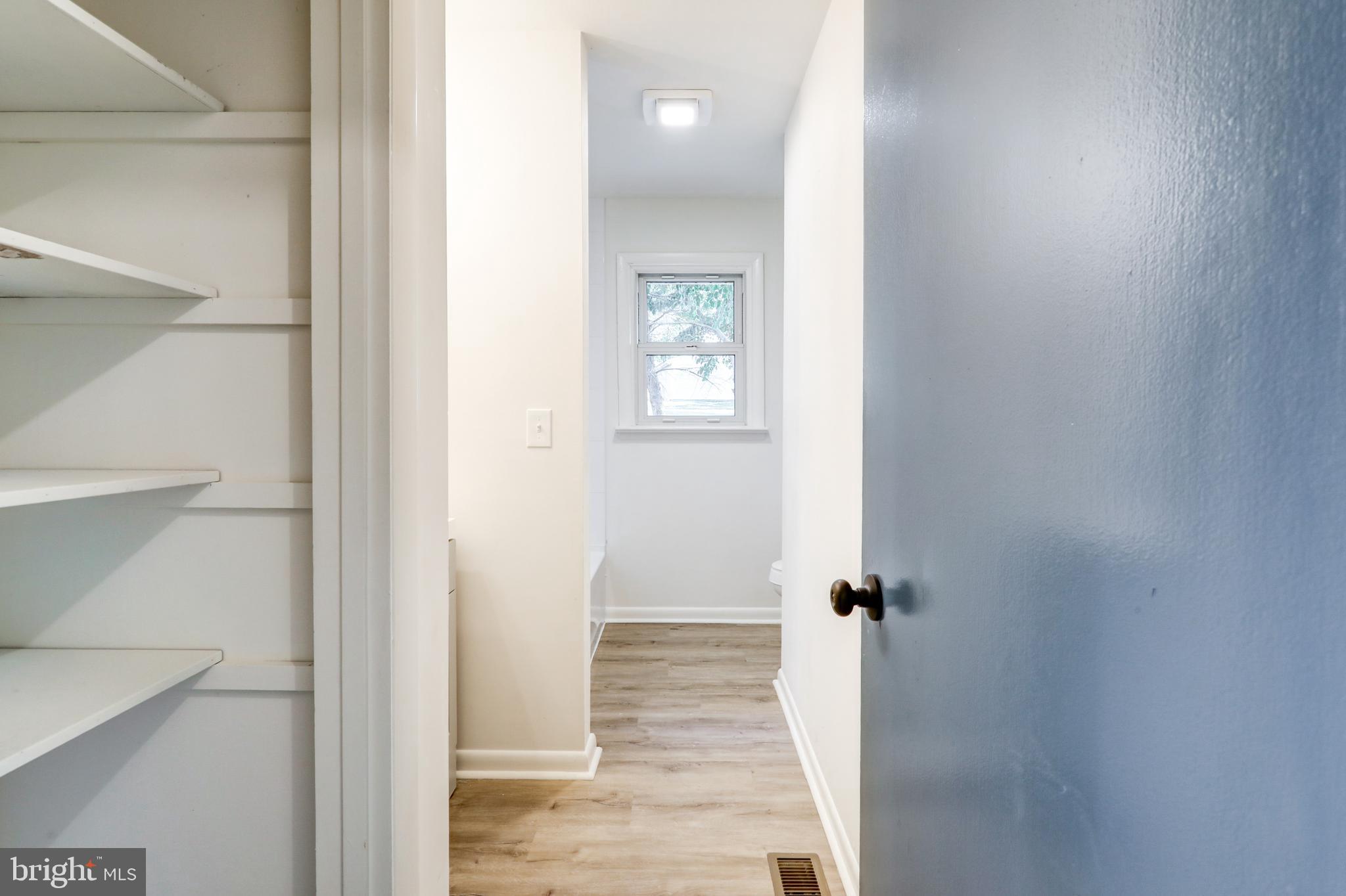1198 Iron Bridge Road Columbia, PA 17512 - Photo 23 of 40 a view of a hallway with wooden floor and closet