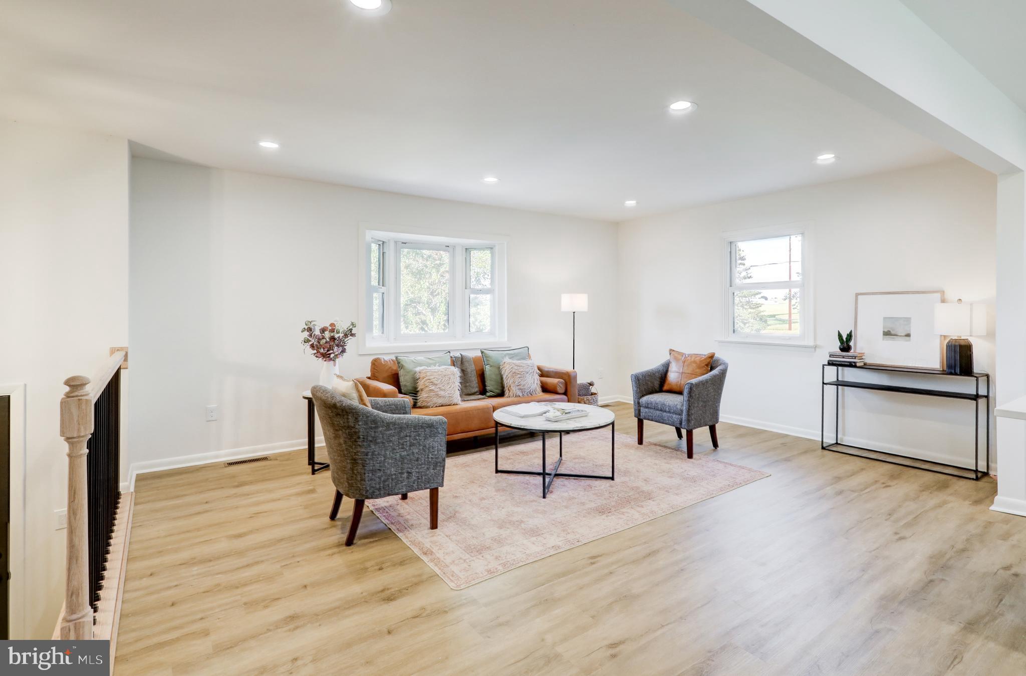 1198 Iron Bridge Road Columbia, PA 17512 - Photo 3 of 40 a living room with furniture and a wooden floor