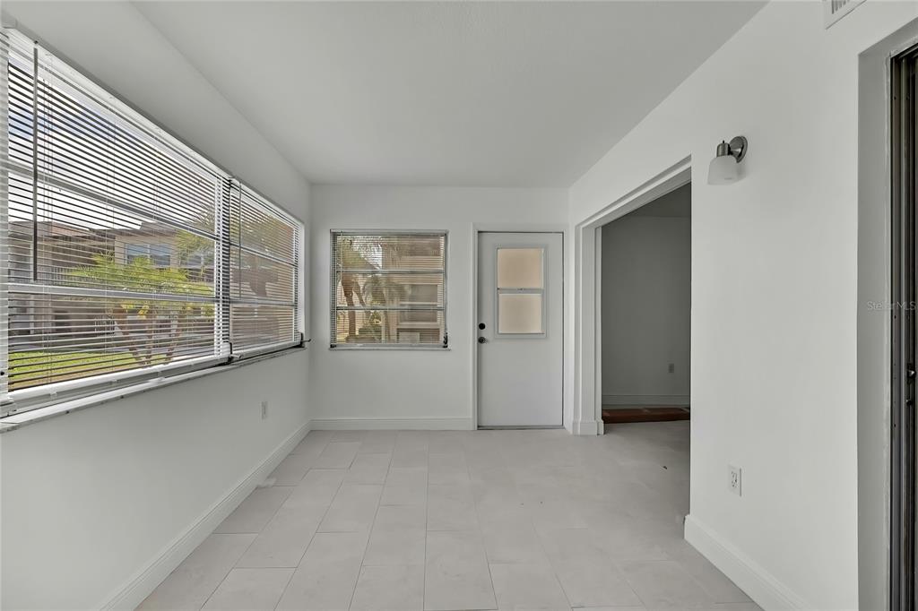 5242 Opal Lane, Unit 106 New Port Richey, FL 34652 - Photo 14 of 22 a view of an empty room with a window