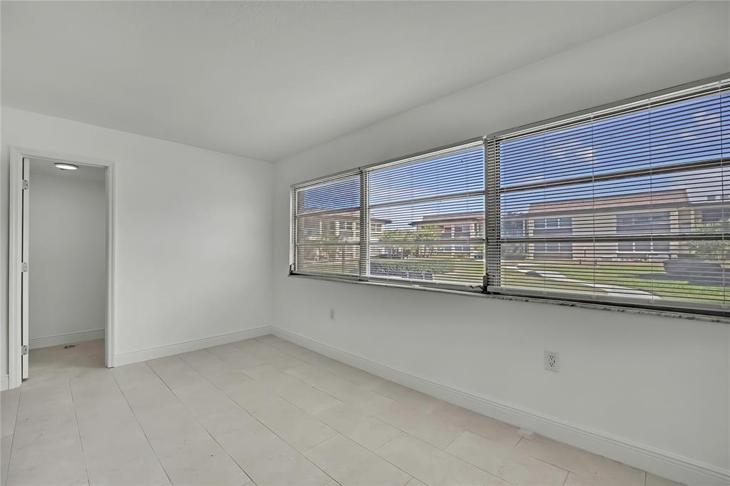 5242 Opal Lane, Unit 106 New Port Richey, FL 34652 - Photo 16 of 22 a view of an empty room with a window