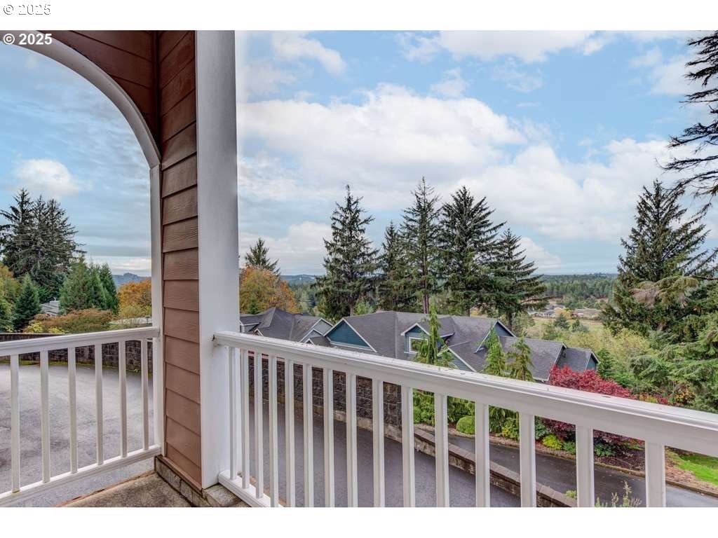 3562 Jake Mann Lane Florence, OR 97439 - Photo 3 of 18 a view of a balcony with wooden fence