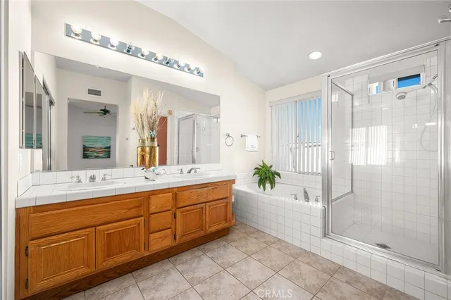 a bath tub sitting in a bathroom next to a window